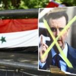Syrians in London continue protests during Ramadan